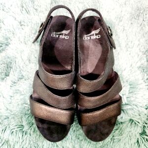 DANSKO SANDALS EXCELLENT CONDITION.  SIZE 38 2.25.IN. CORK WEDGE BRONZE COLOR